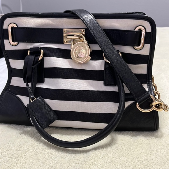 Black and white striped Michael Kors purse with gold detailing - Picture 1 of 8